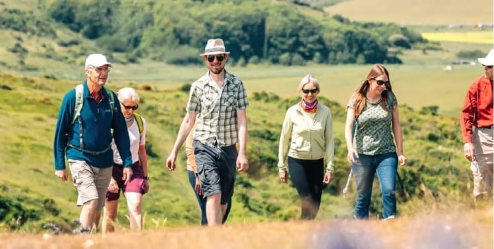 Group of ramblers walking in the countryside